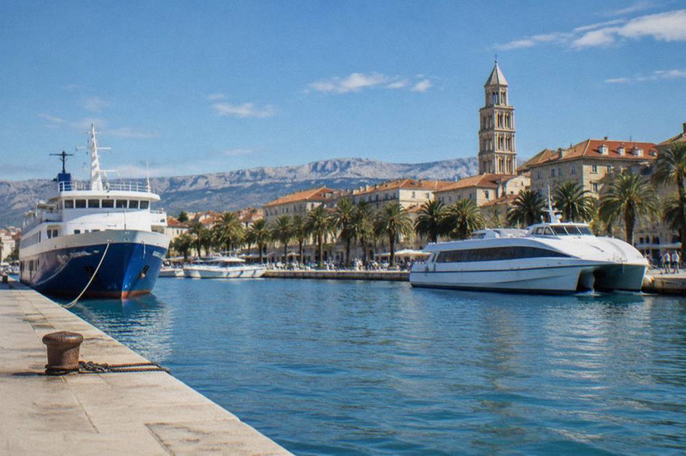 Ferry and catamaran boats moored along the quays near the Diocletian's Palace waterfront in Split