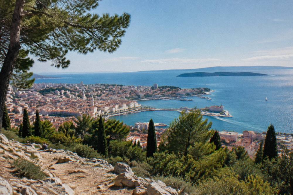 View from Marjan hill over red roofs of Split and the Adriatic sea with islands in the distance