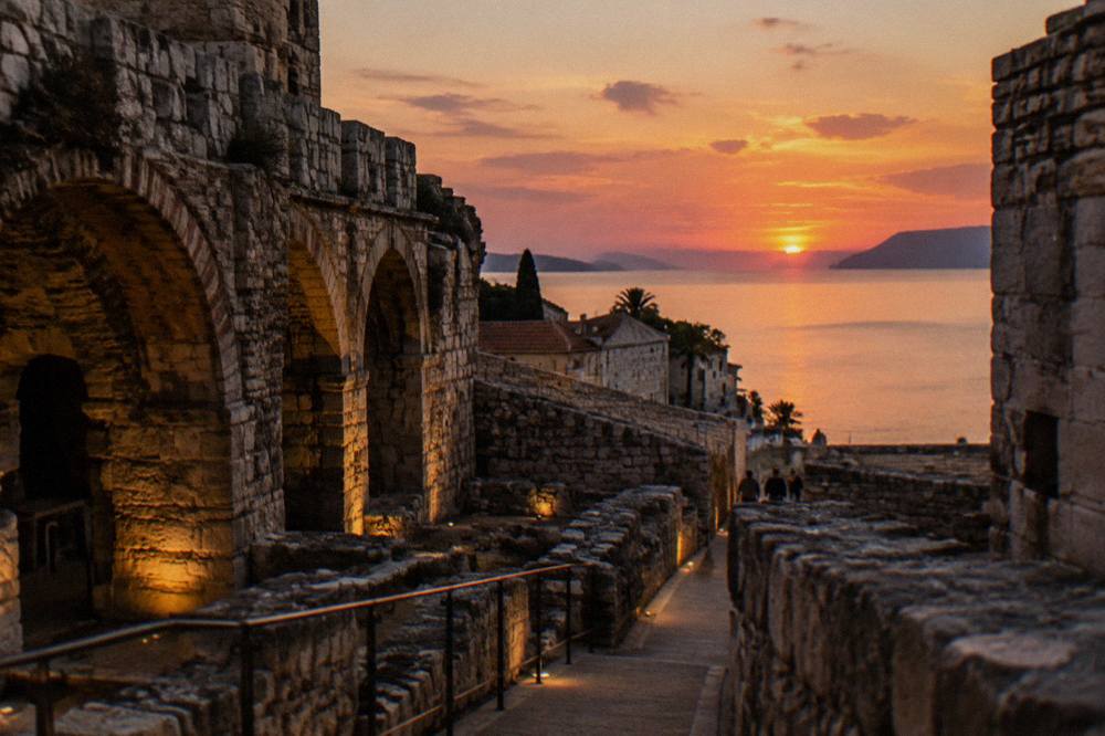 Diocletian's Palace cellars and old town stone walls lit softly on a quiet winter evening in Split