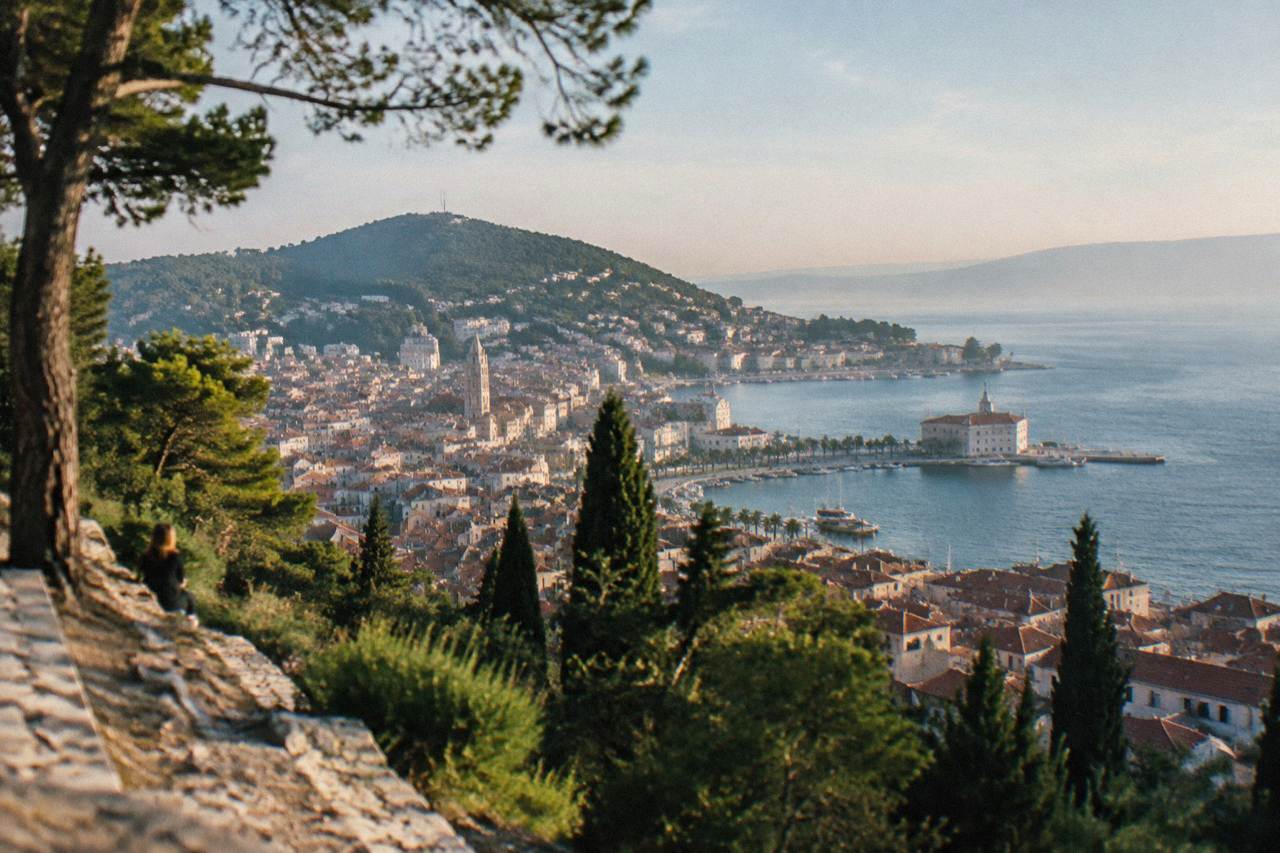 View over the rooftops of Split toward the Adriatic Sea with Marjan hill in the background