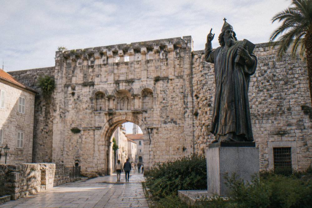 Golden Gate on the north wall of Diocletian's Palace with the bronze Grgur Ninski statue