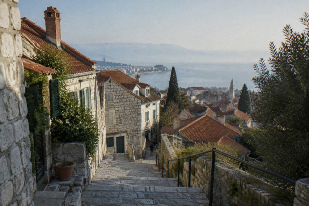 Old stone houses in Veli Varos seen from a staircase leading toward Marjan