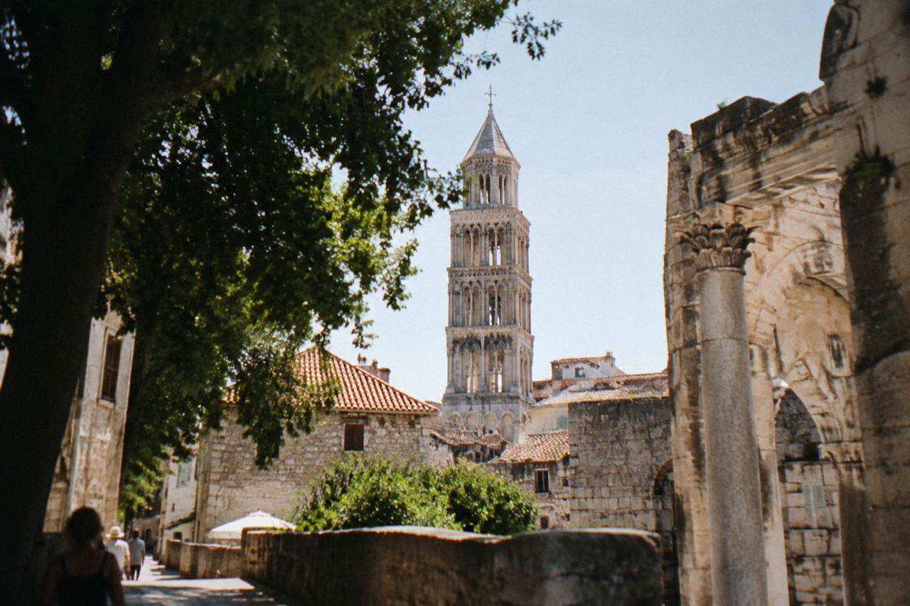 The bell tower of the Cathedral of Saint Domnius rising above the rooftops inside Diocletian's Palace in Split