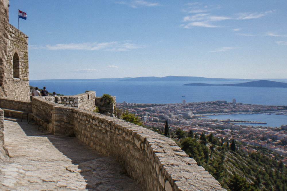 A stone terrace overlooking the city of Split, the sea and offshore islands