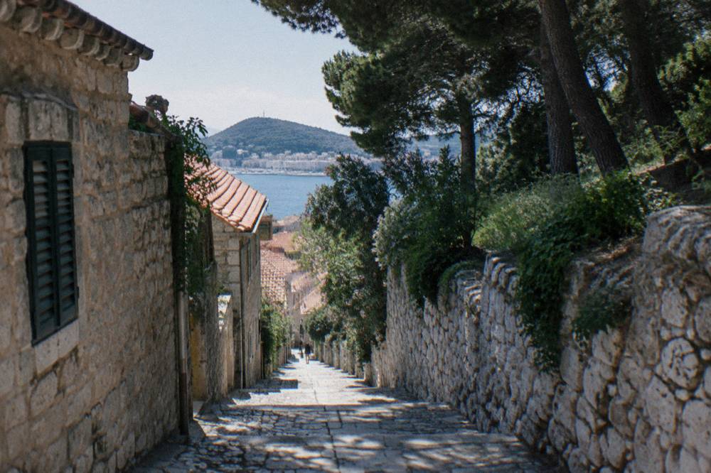 Narrow stone lanes of the old Veli Varos quarter leading toward the Marjan hill in Split