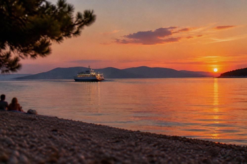 An evening ferry leaving a Dalmatian harbour with the island hills behind