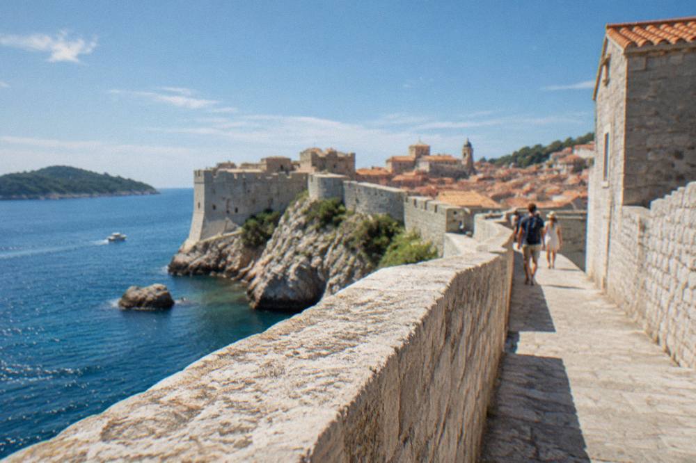 Walking path on top of the Dubrovnik city walls with the sea on one side