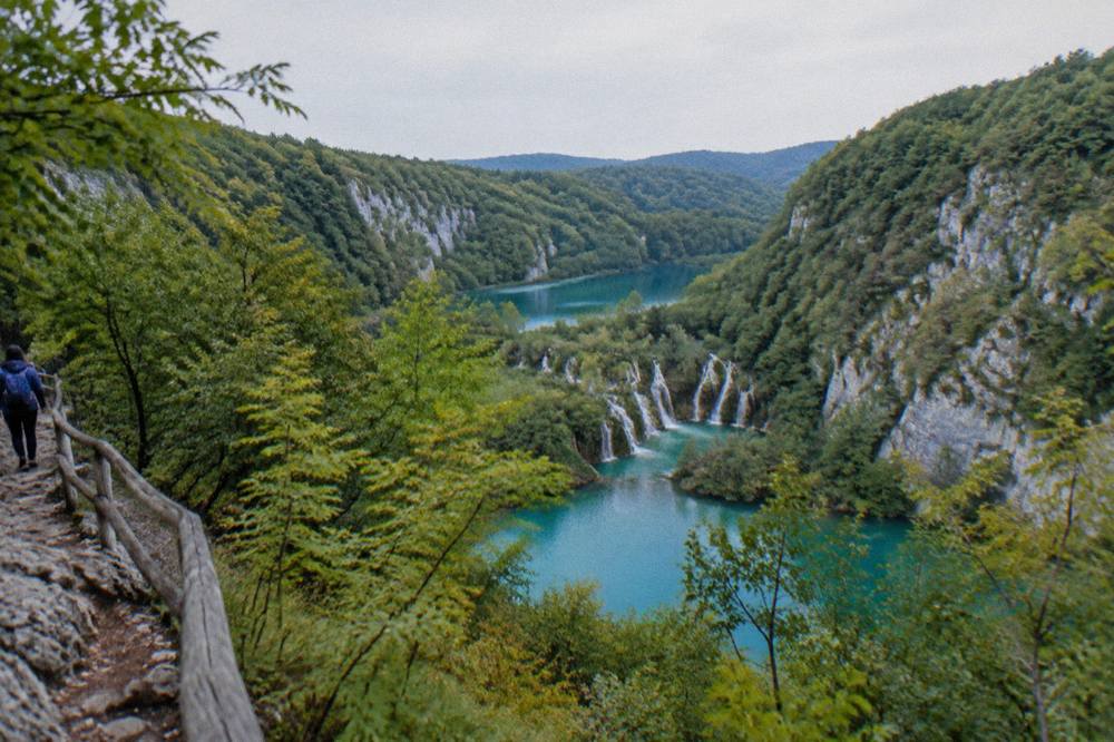 View over interconnected lakes and forest from a high trail at Plitvice