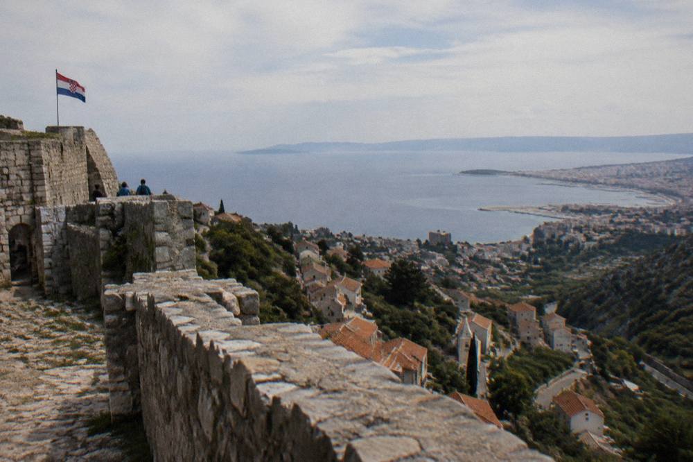 View from Klis Fortress walls over the Klis village and the Split coastline