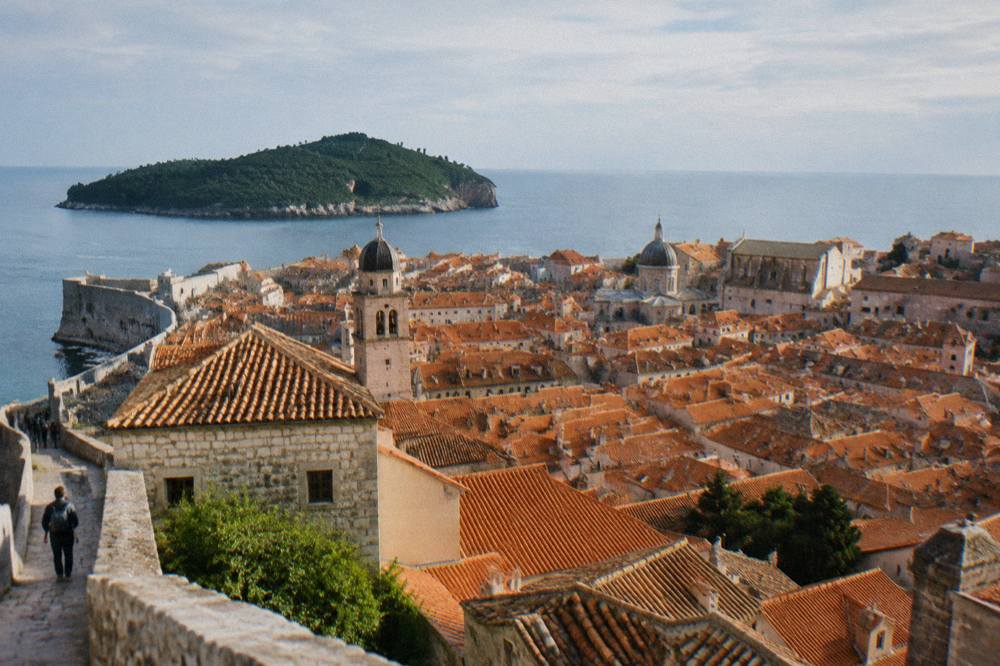 Walled old town rooftops of Dubrovnik seen from above the city