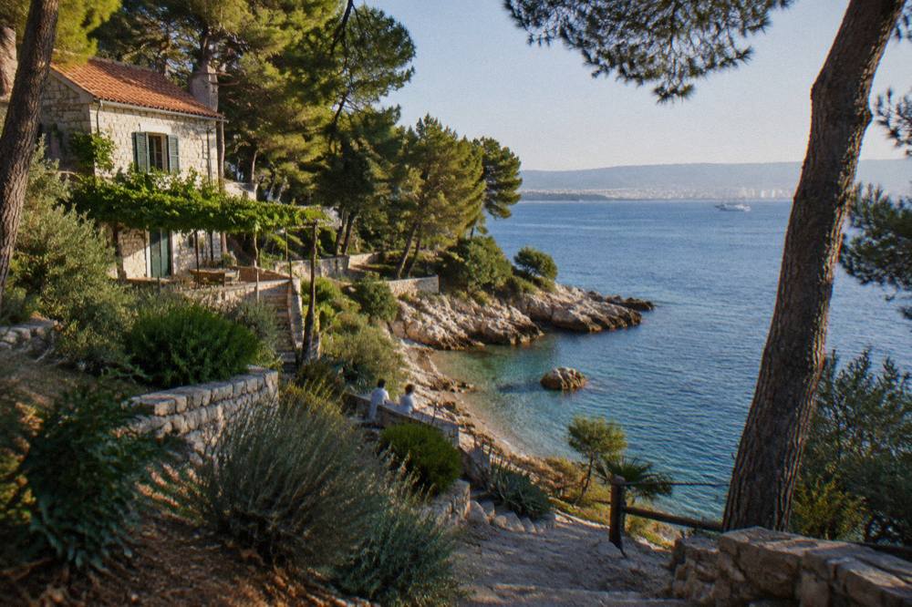 Stone villa with terraced garden above a quiet cove on the Marjan peninsula near Split